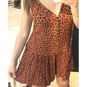 Orange patterned romper